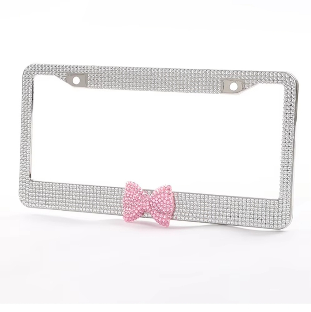 Silver rhinestone car plate cover with pink bow